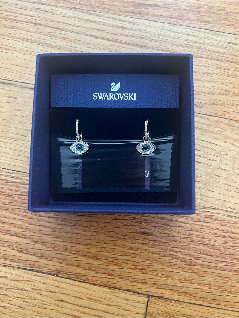 Swarovski Blue and Clear Crystal Evil Eye Huggie Earrings